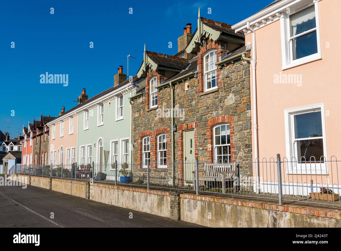 Pretty terraced houses along the seafront in Strangford, County Down, Northern Ireland, United Kingdom, UK Stock Photo