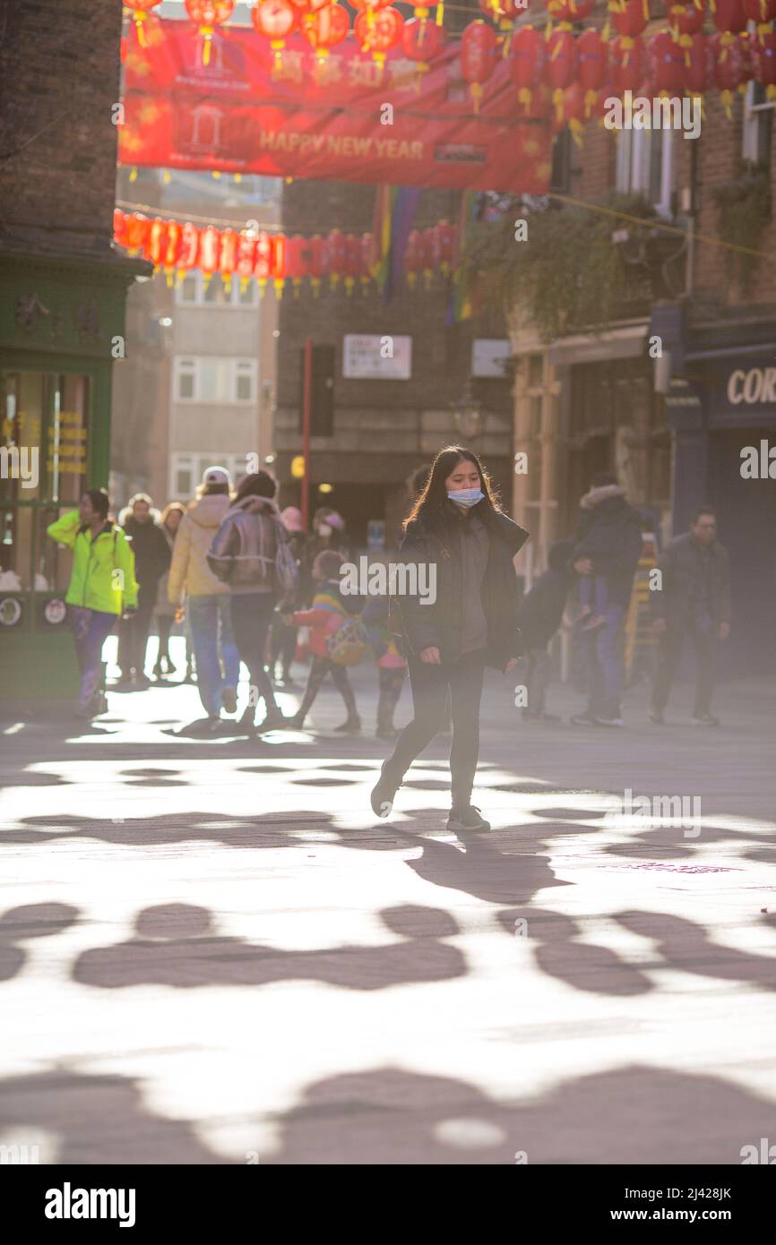 People stroll in Chinatown, central London, as the Lunar New Year falls on 1 February this year. Stock Photo
