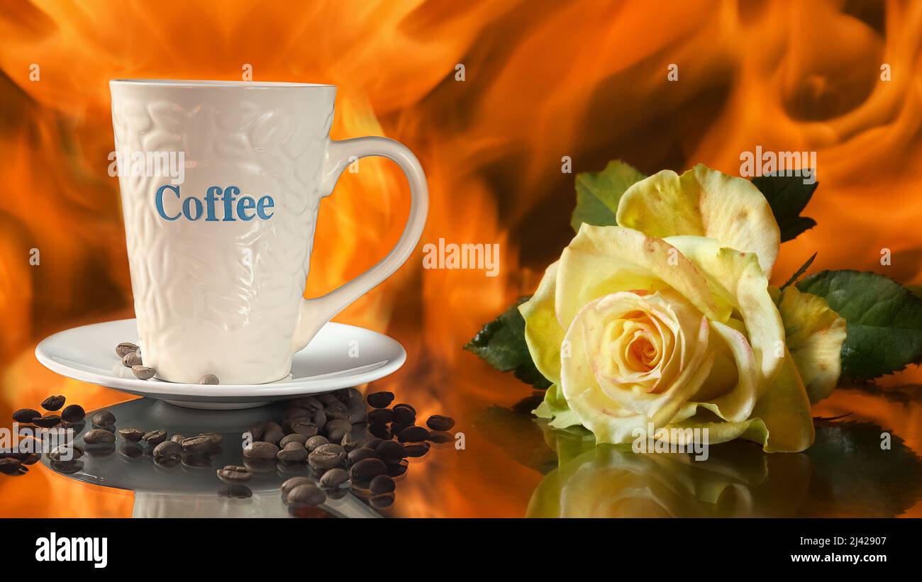 A rose, a cup of coffee and roasted coffee beans on the background of an open fire. Selective focus Stock Photo