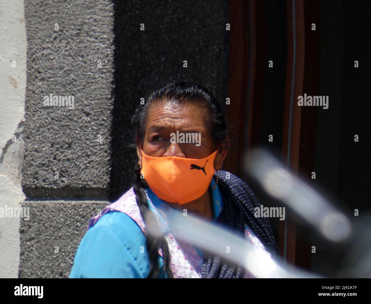 People with mask in Mexico streets. Stock Photo