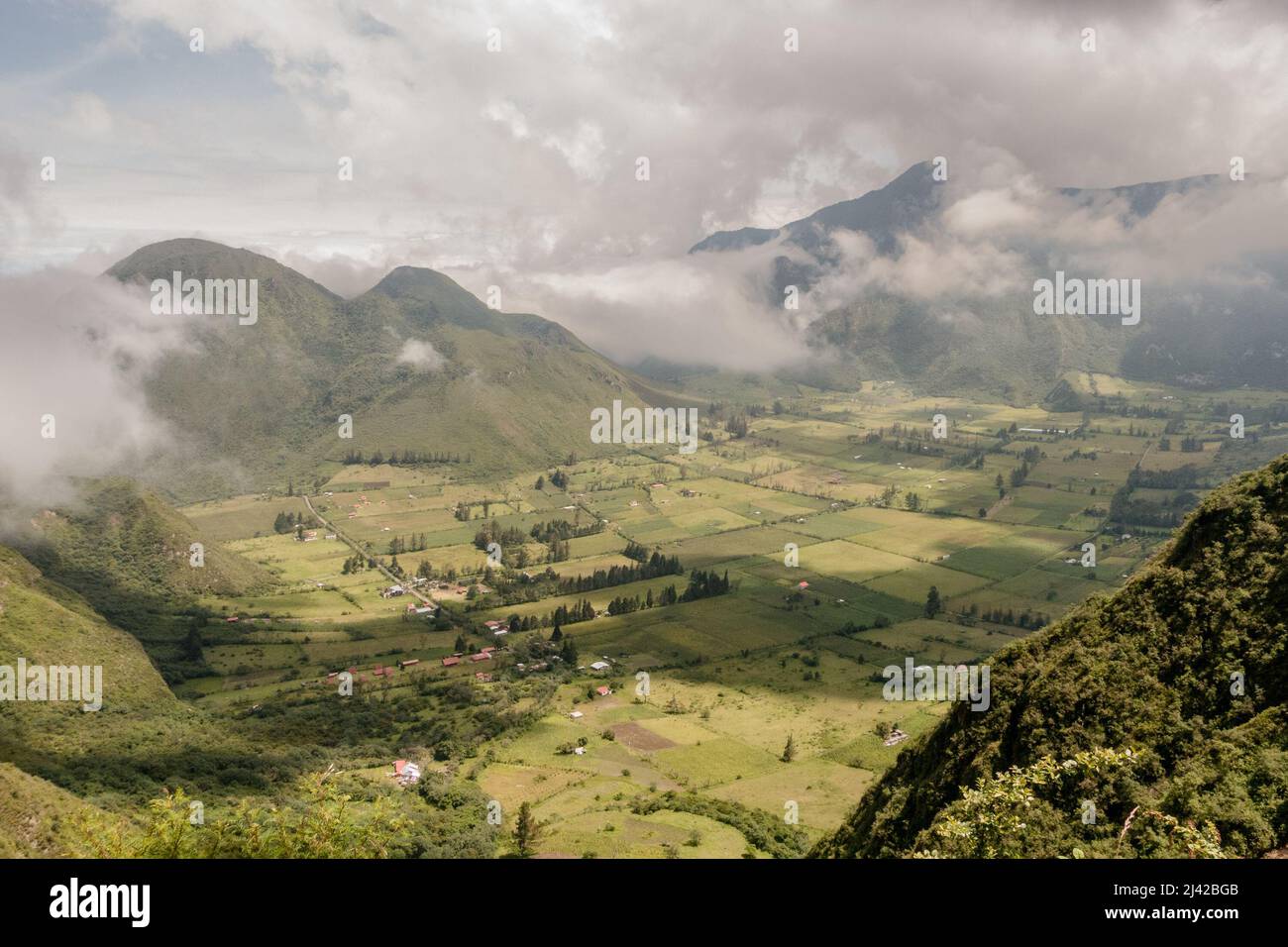 Pululahua crater. This geobotanical reserve near Quito, Ecuador is home to the world's only inhabited crater, and also holds the dormant Pululahua vol Stock Photo