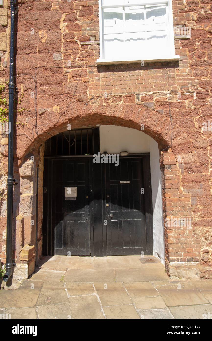 EXETER, UK JULY 18, 2021 recessed entrance doors to historic and
