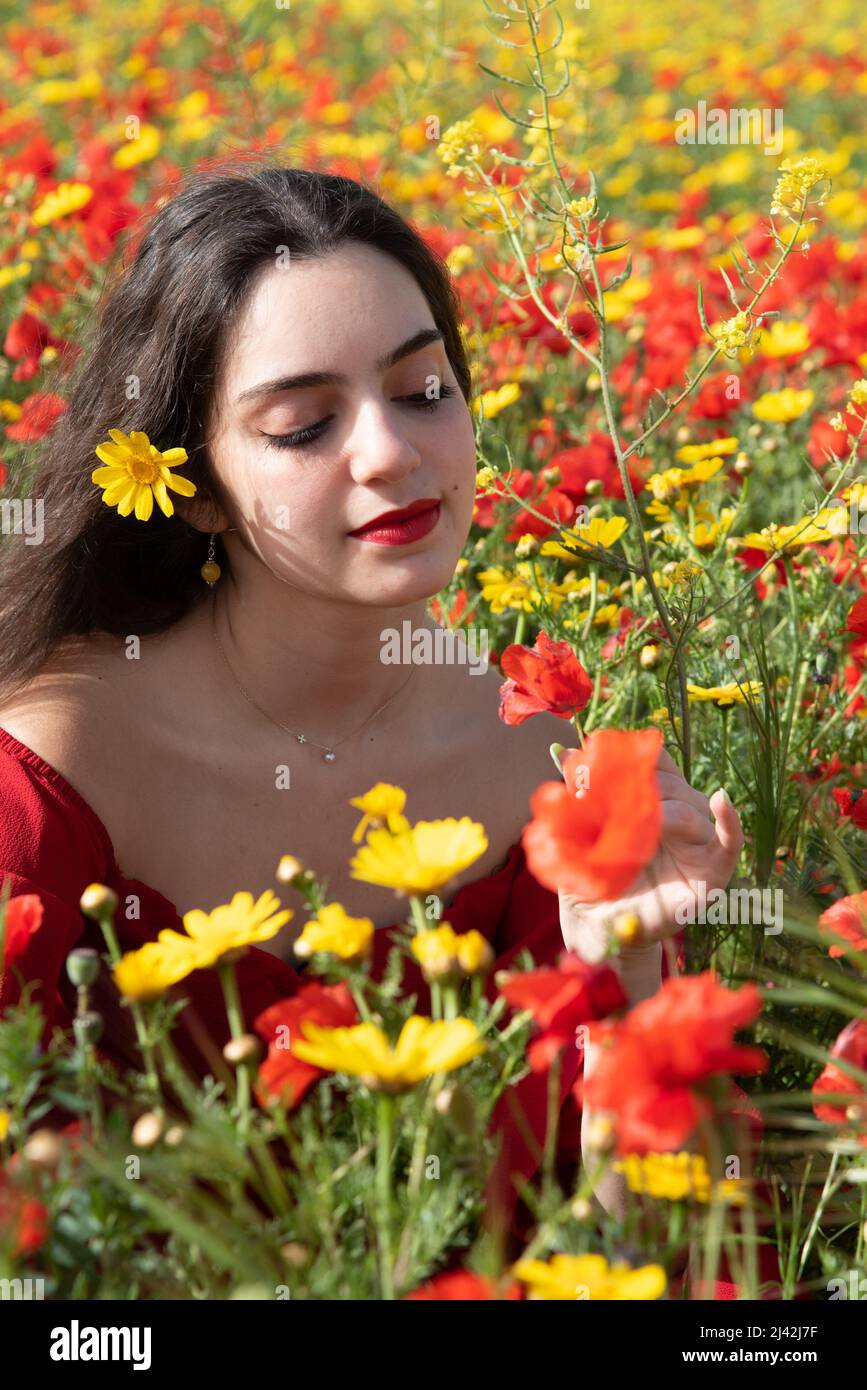 Portrait of a young woman with closed eyes in the field in spring Stock ...