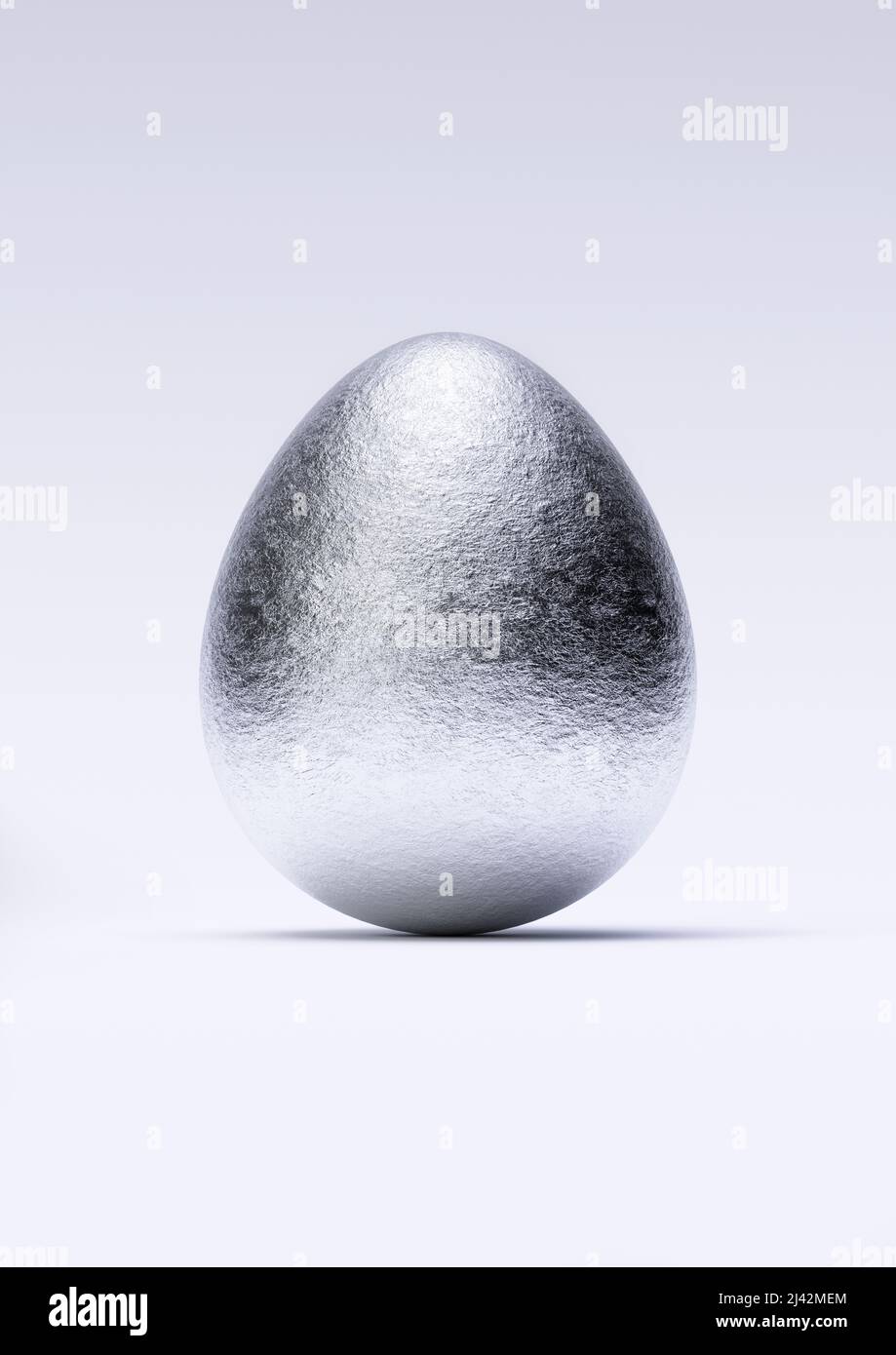 Chocolate easter egg with shiny silver Aluminium foil on white