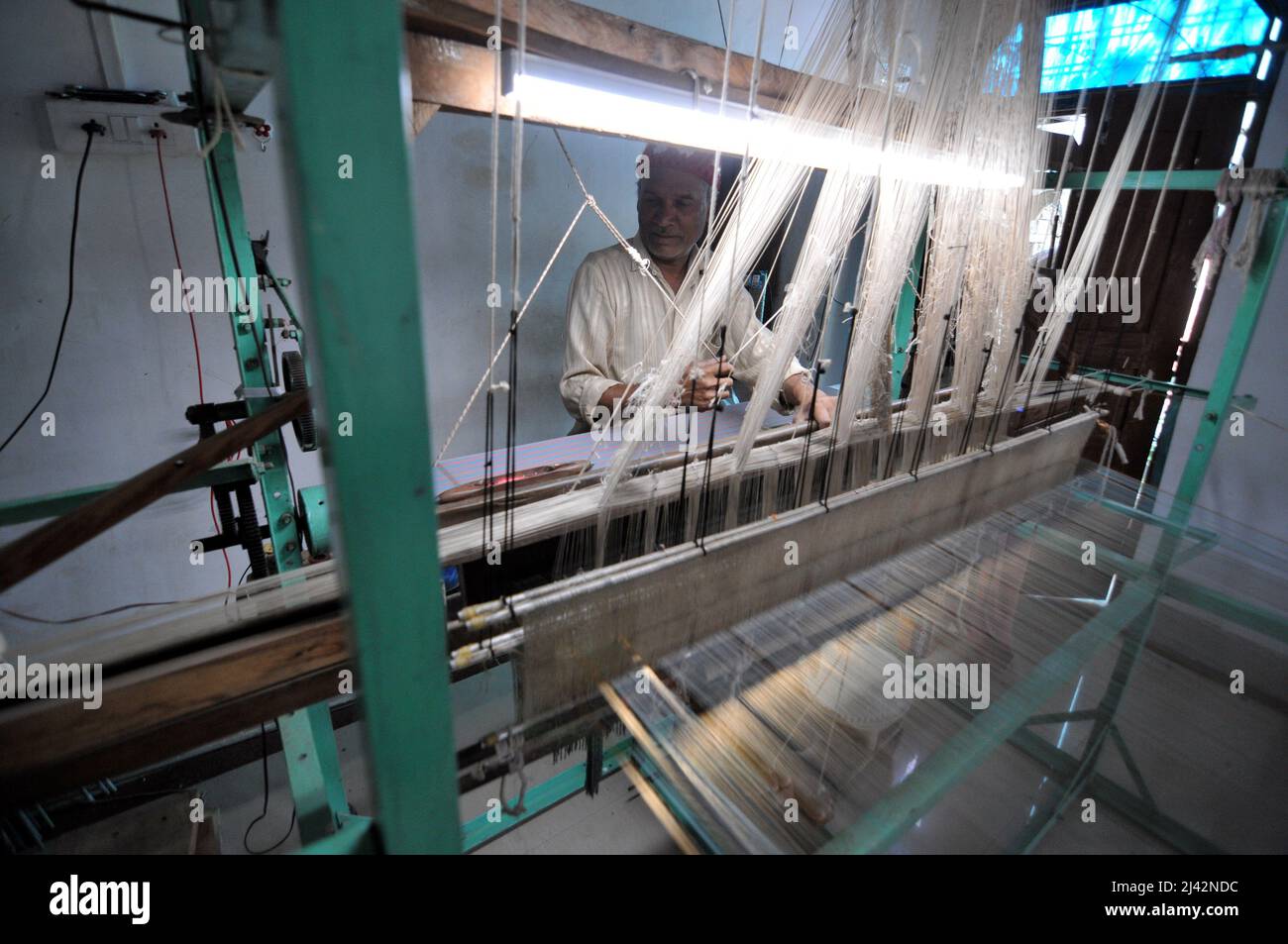 Workers manufacture Chanderi Silk and Cotton Sarees by weaving in ...