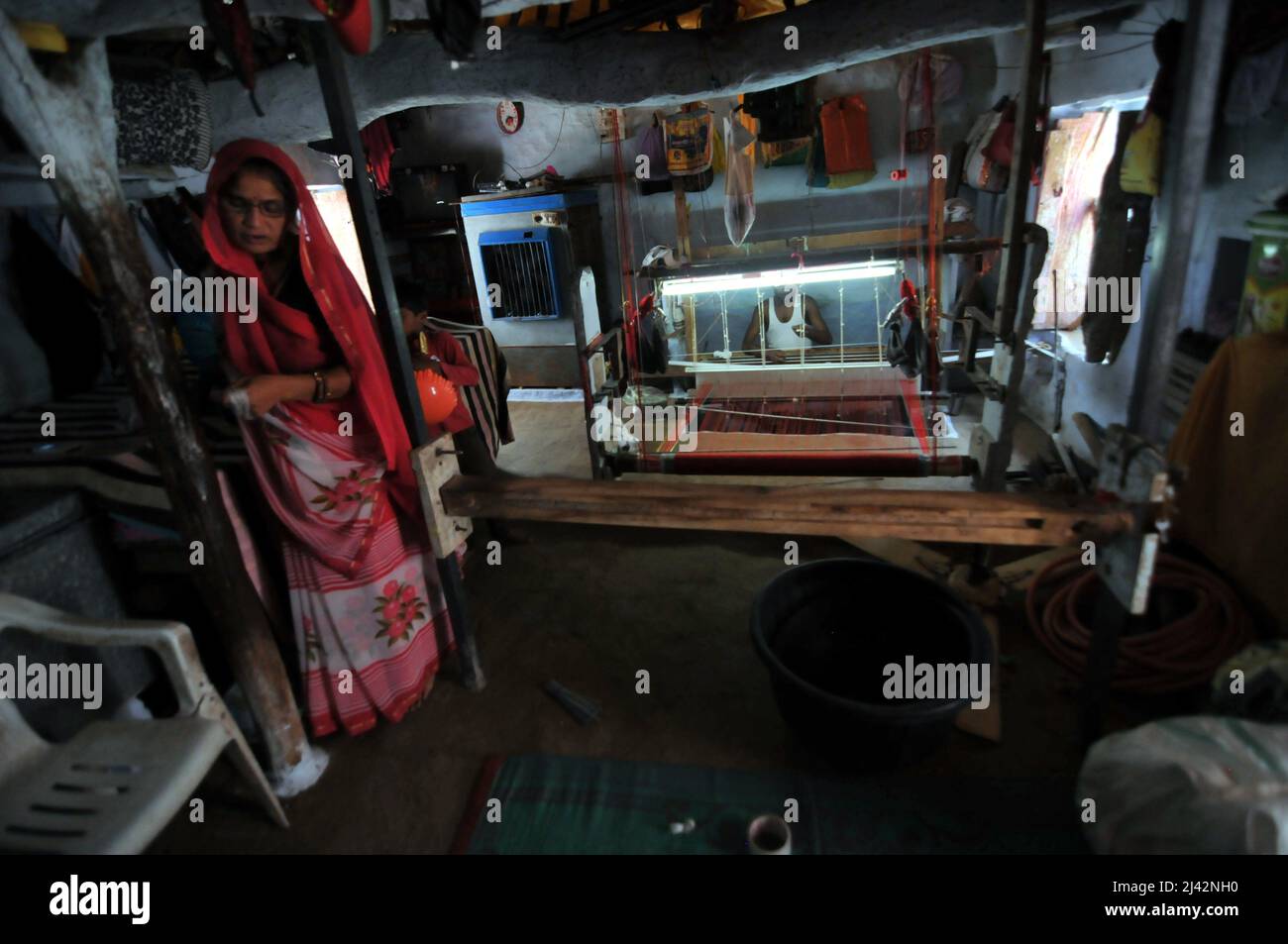 Workers manufacture Chanderi Silk and Cotton Sarees by weaving in ...