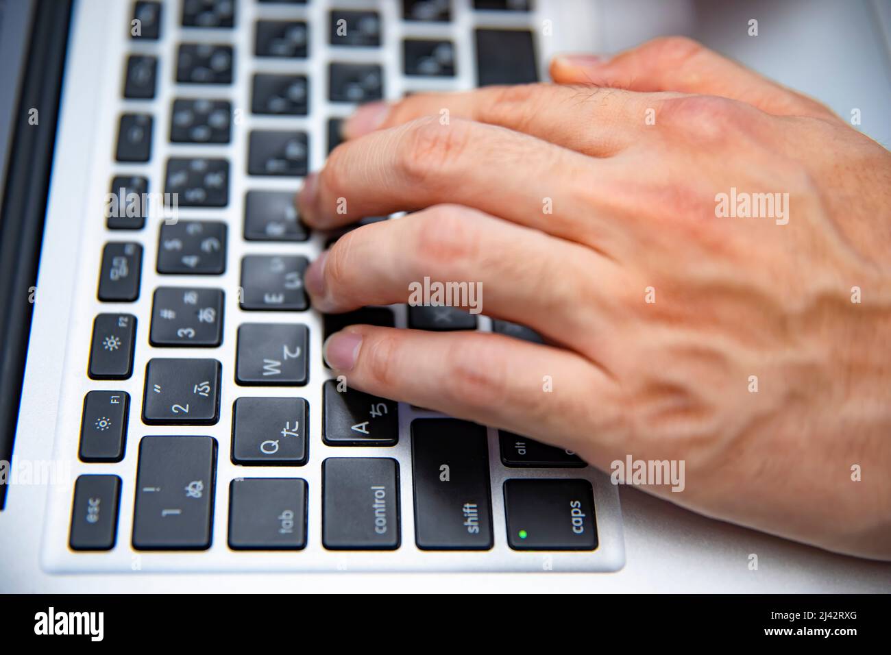 Close up of a human hand on a computer keyboard hi-res stock ...