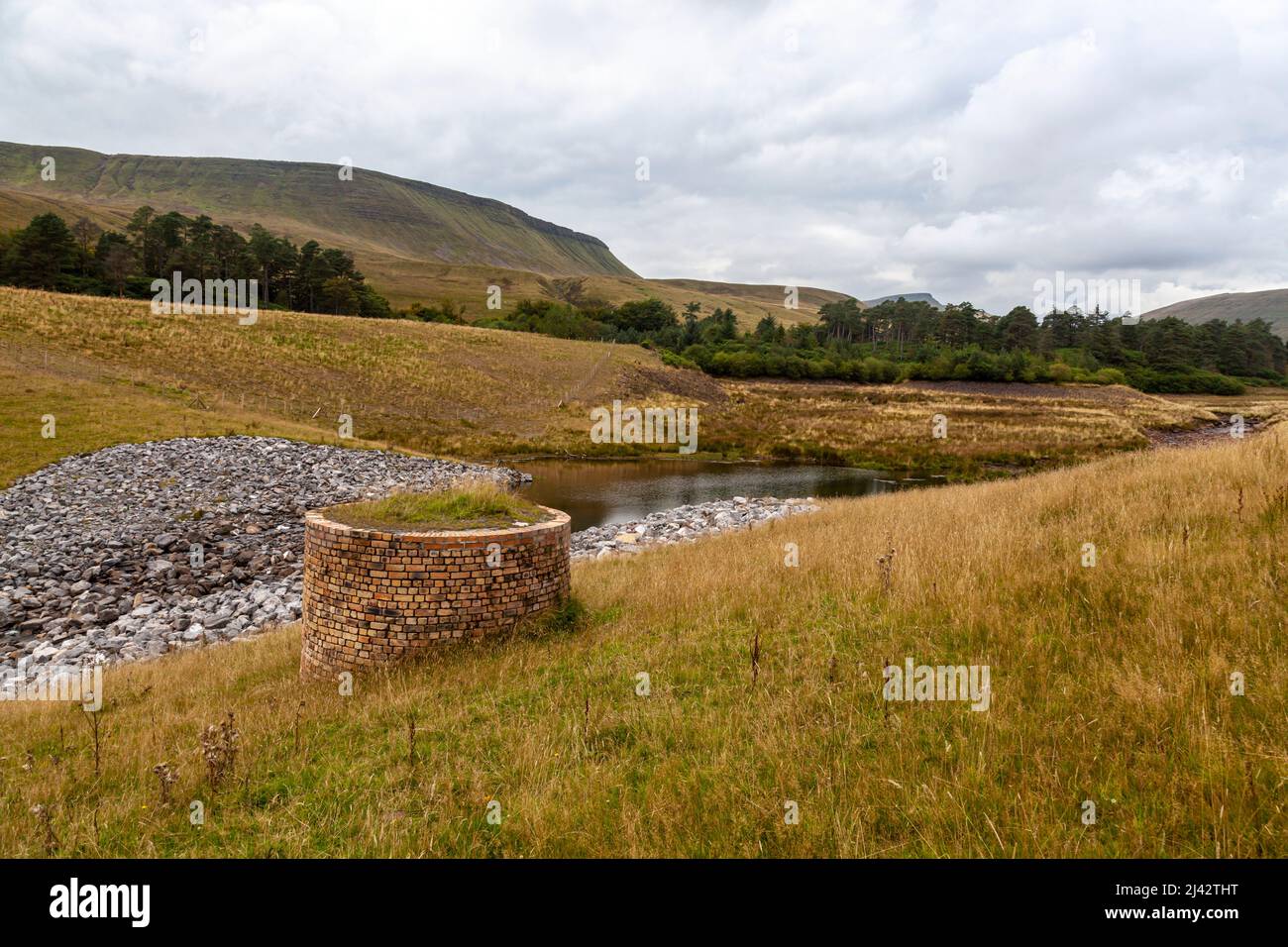 What's left of the dam of the now disused and relandscaped lower Neuadd reservoir. The Brecon