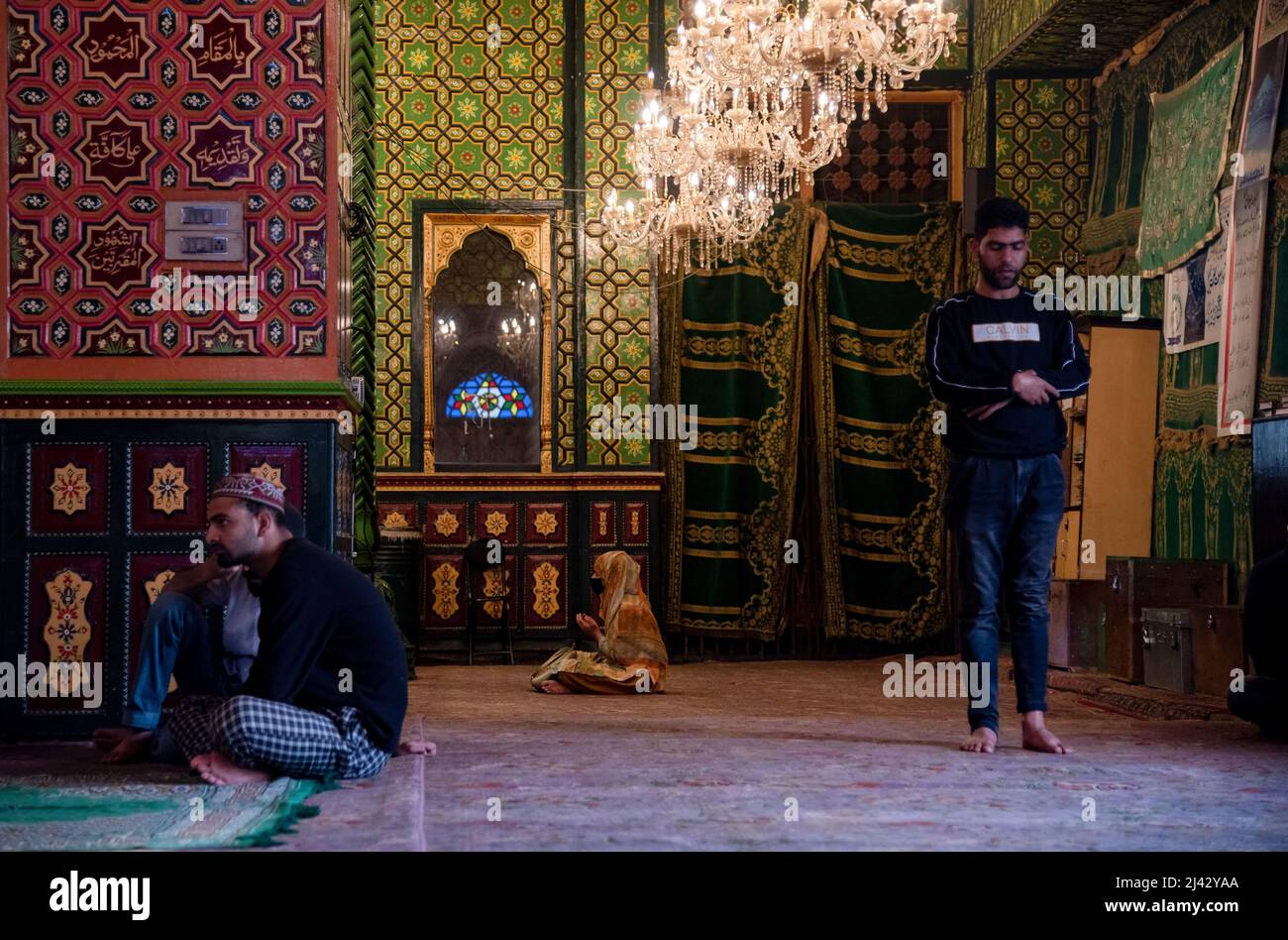 Kashmiri Muslim worshippers pray inside a shrine during Islamic holy ...