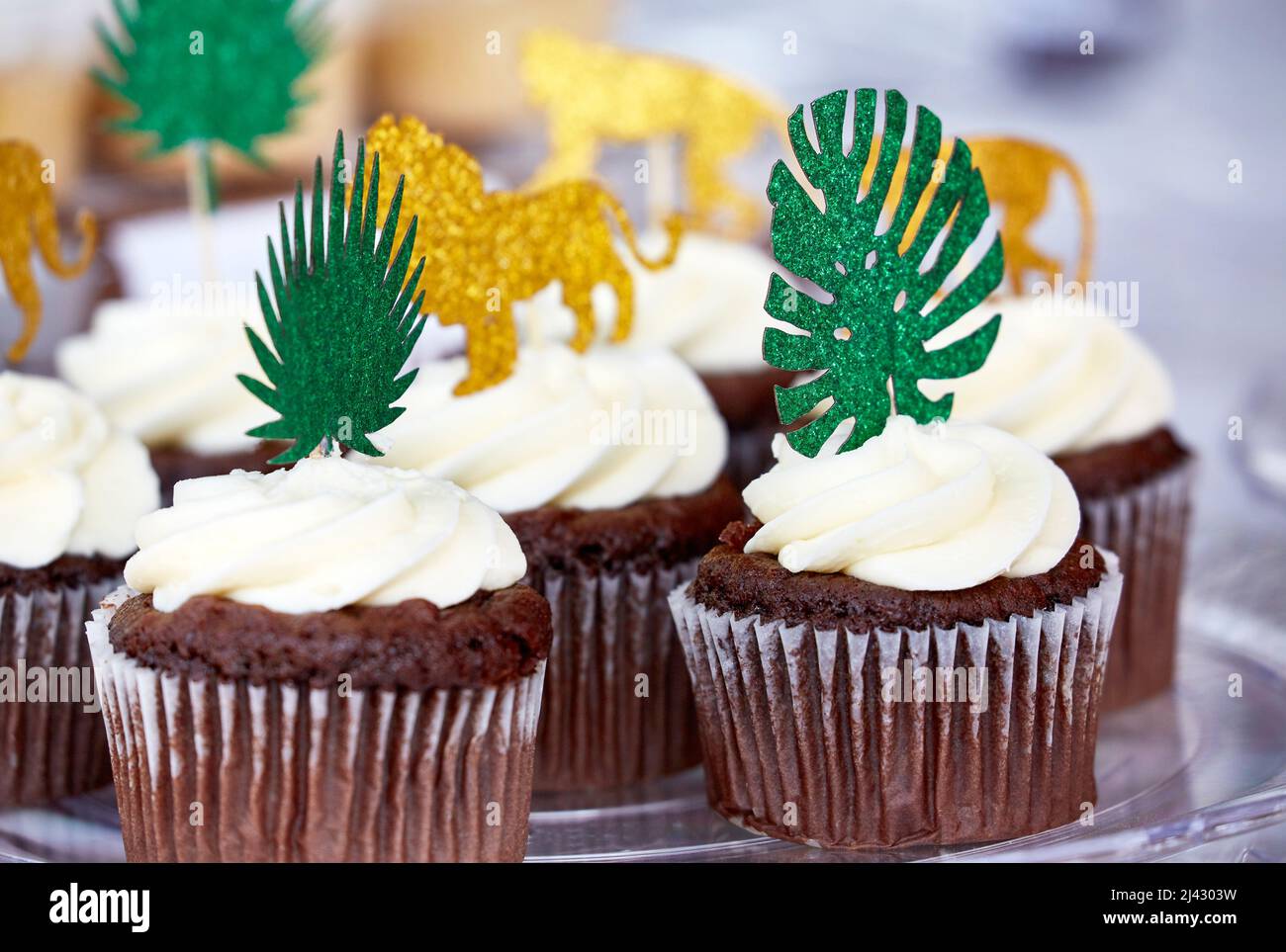 Chocolate Cupcakes with Vanilla Frosting with shallow depth of field Stock Photo
