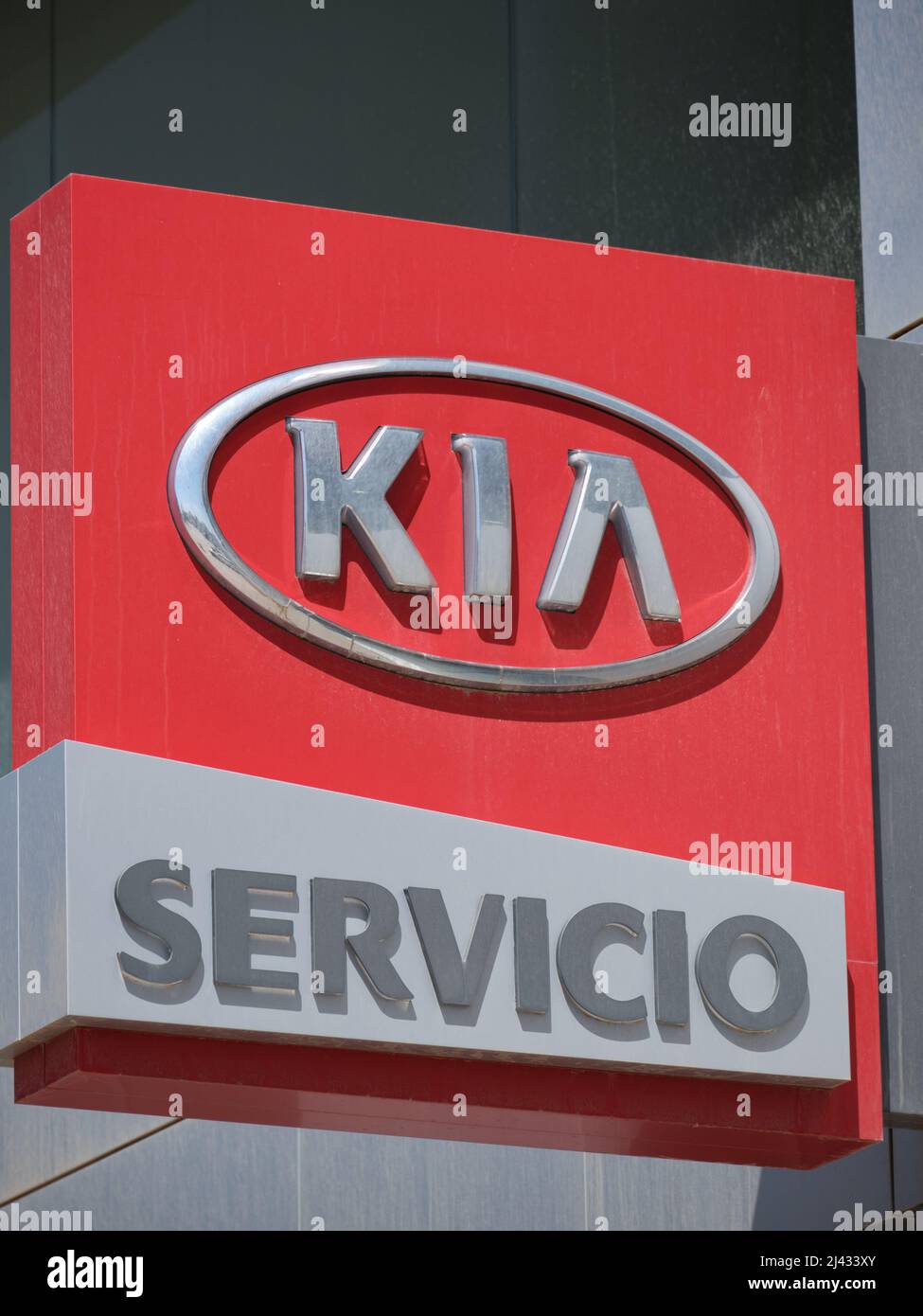 Kia service logo and text sing of korean car dealership in Fuengirola, Malaga province, Spain. Stock Photo