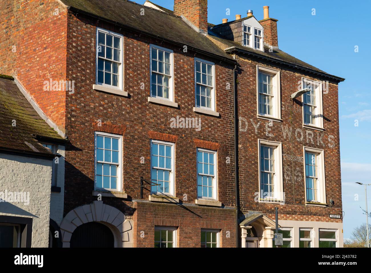 Carlisle, England - United Kingdom - March 17th, 2022: Old Dye Works building on Castle Street in Carlisle Towne Center. Stock Photo