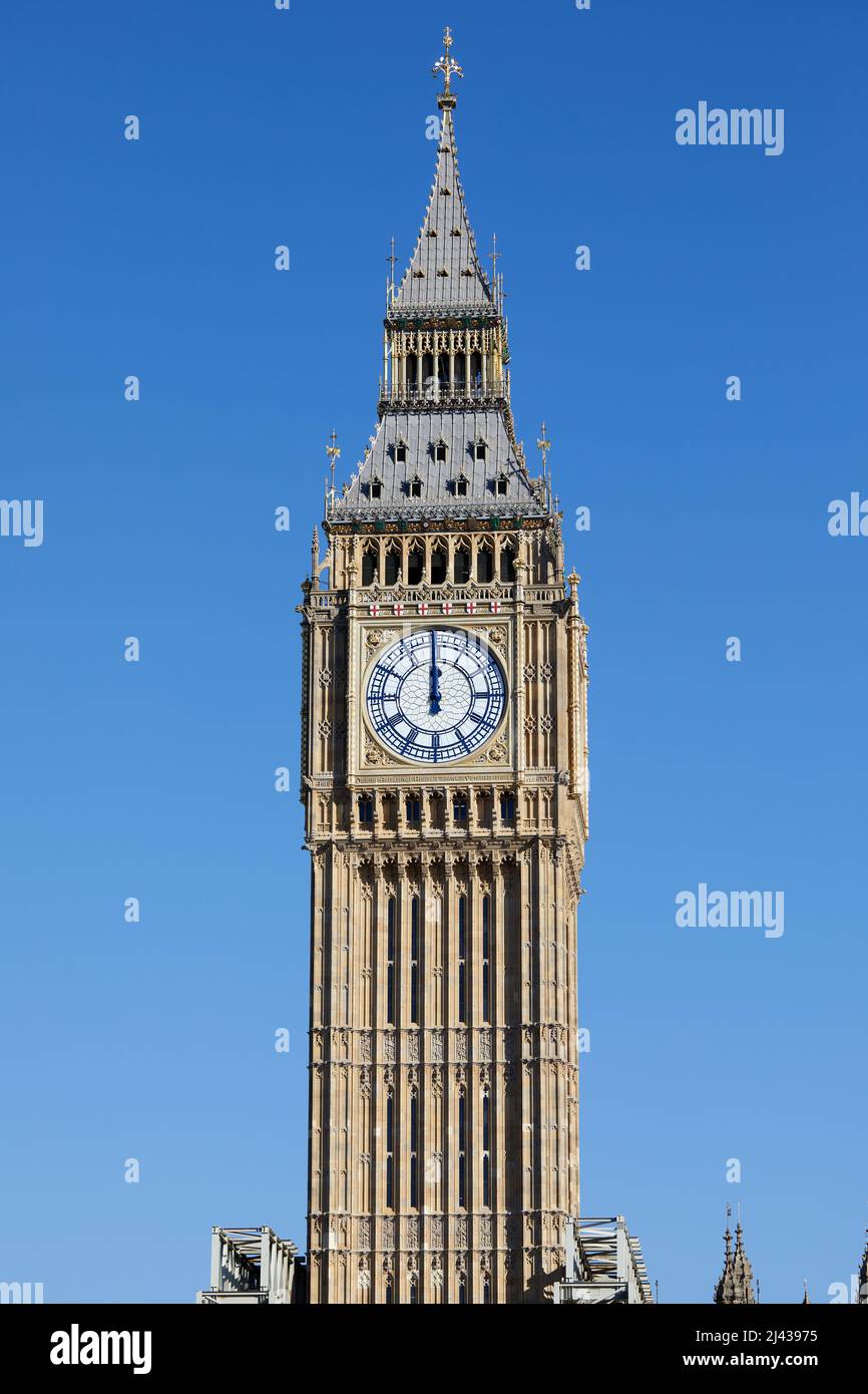 London, U.K. - 19 Mar 2022: The north-facing clock face of the Elizabeth Tower at the Palace of Westminster revealed following completion of a five-year restoration of the famous landmark. Stock Photo