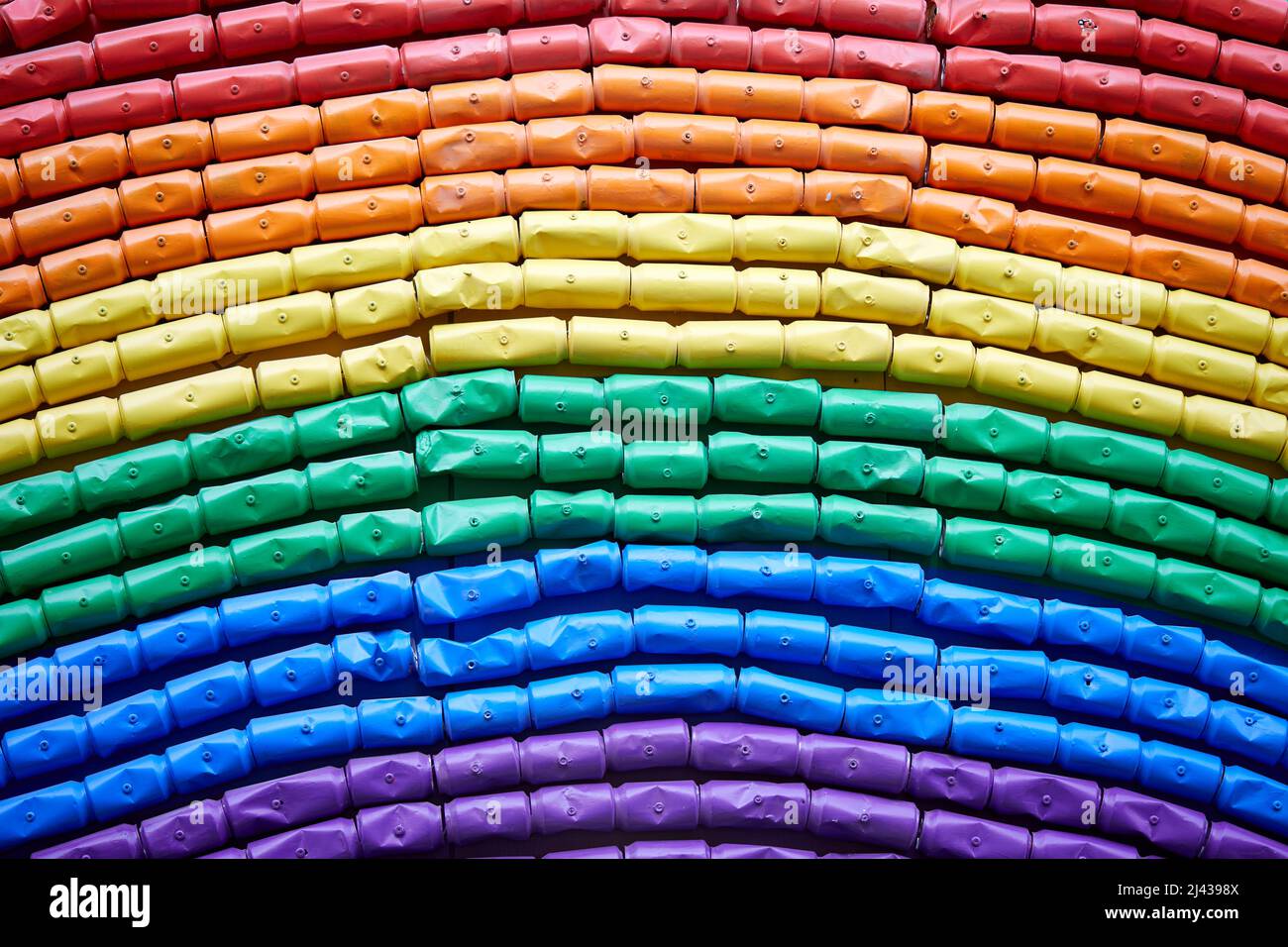 London, U.K. - 21 Mar 2022: A rainbow made from recycled cans, created by the communications programme Every Can Counts, which seeks to empower people to recycle their drink cans. Stock Photo