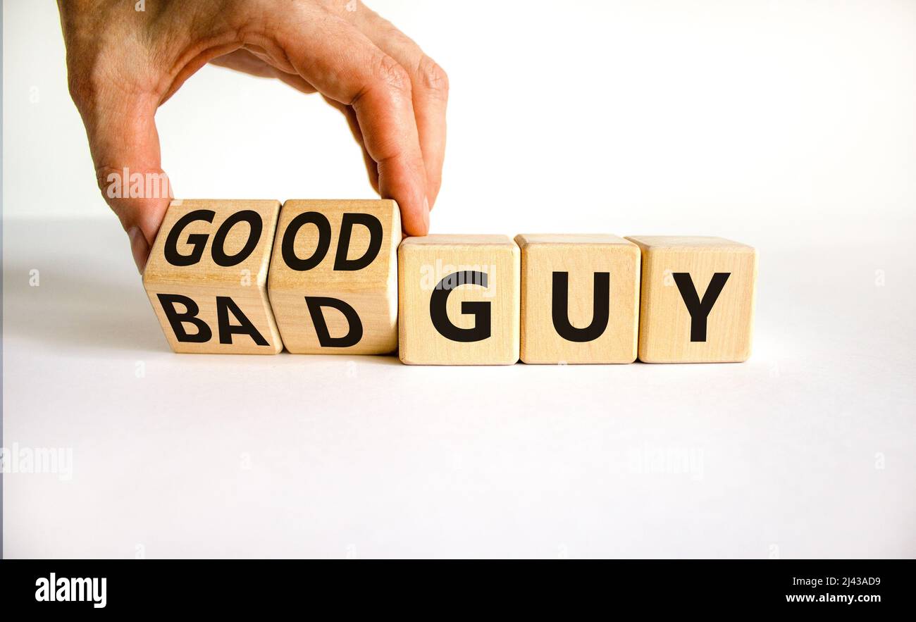 Good or bad guy symbol. Businessman turns cubes and changes concept