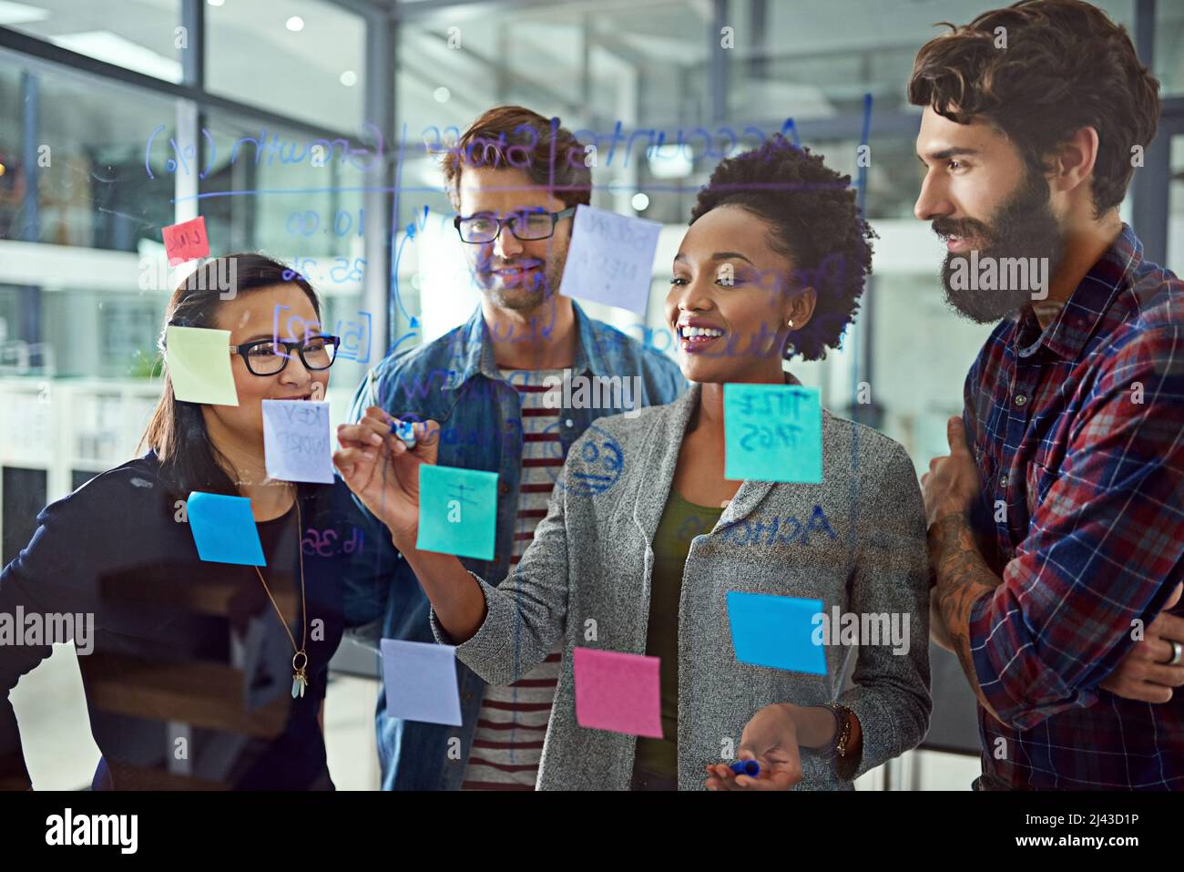Its all about strategic planning. Cropped shot of coworkers brainstorming in a modern office. Stock Photo