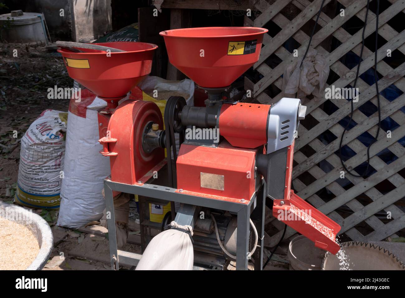 Mini electric rice milling machine Stock Photo Alamy