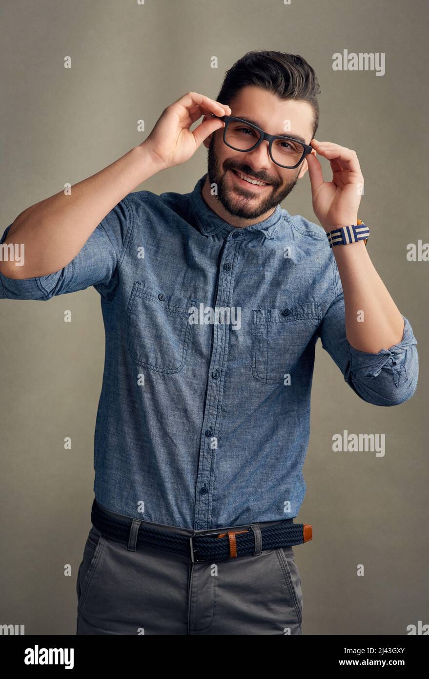 His confidence is clearly noticeable. Studio portrait of a handsome ...