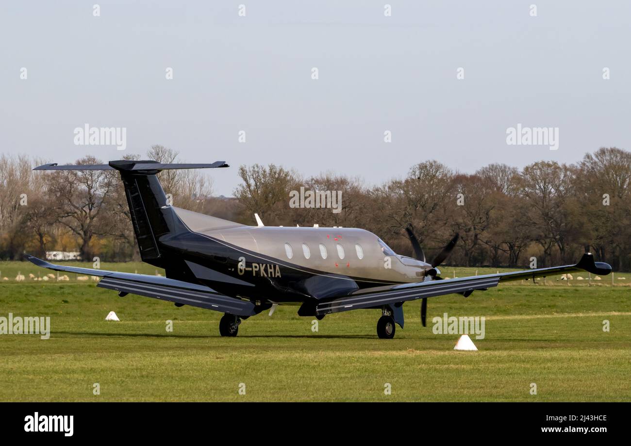 Pilatus PC-12 Aircraft G-KPHA arrives at Headcorn airport Kent before departing shortly afterewards for its one hour flight to Leeds Bradford. Stock Photo