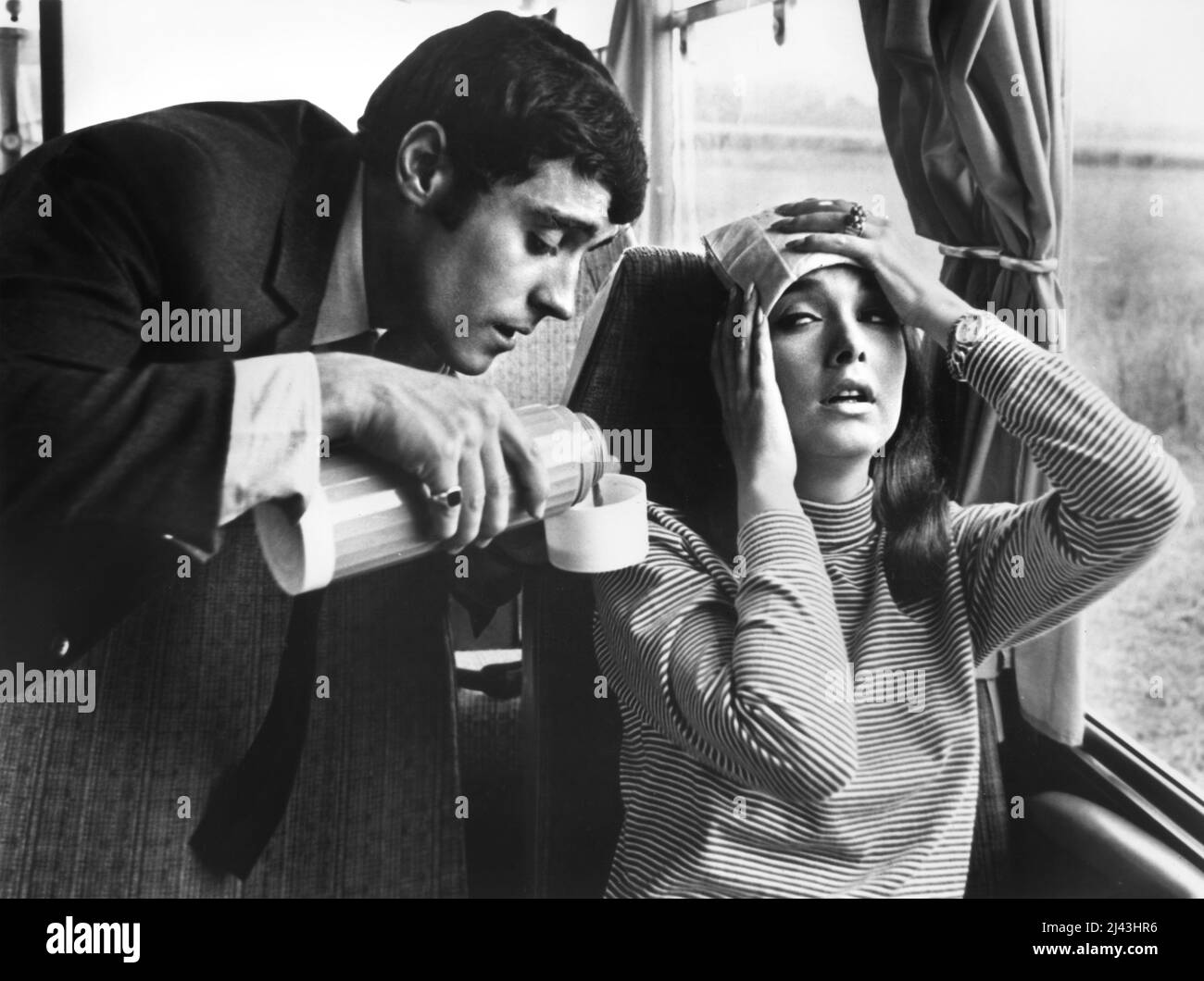 Ian McShane, Suzanne Pleshette, on-set of the Film, 'If It's Tuesday This Must Be Belgium', United Artists, 1969 Stock Photo