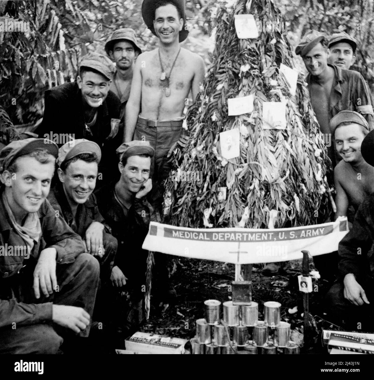 Australian Manned American General Stuart Tanks In Action -- Only Christmas tree seen on the Buna front was at an advanced American dressing station. Decorations are of cotton wool and cigarette cartons. February 6, 1943. (Photo by Department of Information, Commonwealth of Australia). Stock Photo