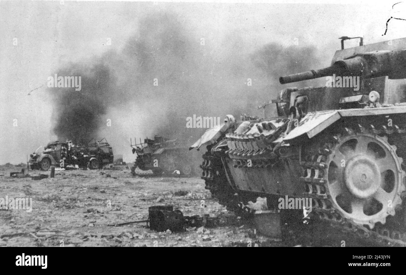 German Tanks -- The end of an attack ***** tanks and armored vehicles left at large by their drivers after an engagement with South African troops in the Lybian Campaign. May 16, 1942. (Photo by The Associated Press of Great Britain Ltd.) Stock Photo