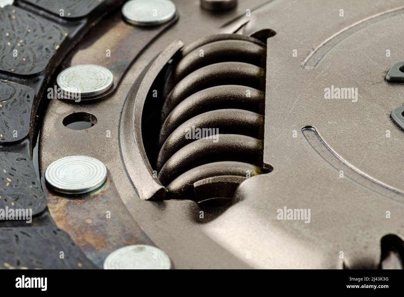 Used car clutch, macro shots for damping springs, isolated on a white background. Stock Photo