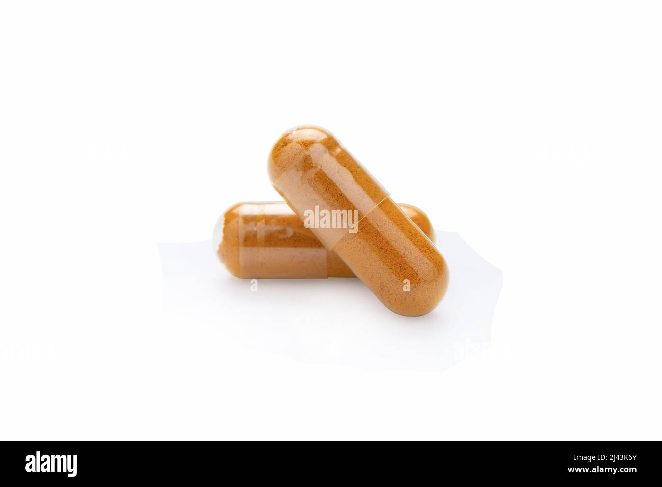 Turmeric Capsule isolated on white background with clipping path Stock Photo