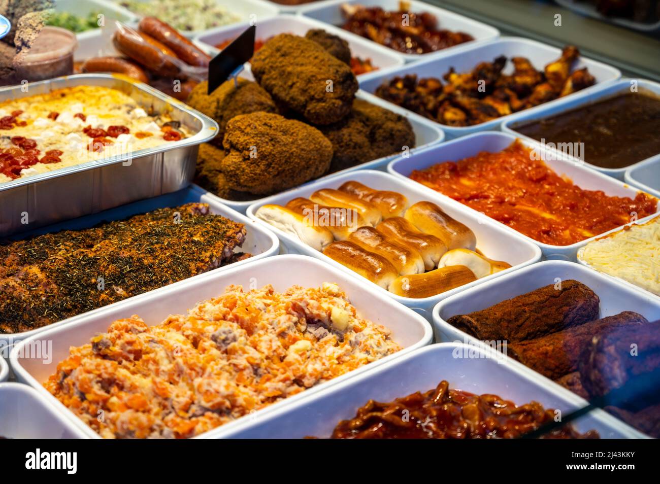 Assortment of gourmet meat dishes in butchery delicatessen shop, food background Stock Photo Alamy