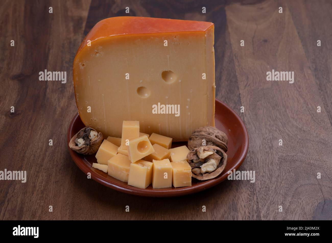 Dutch hard cow milk old yellow cheese from Gouda Stock Photo - Alamy