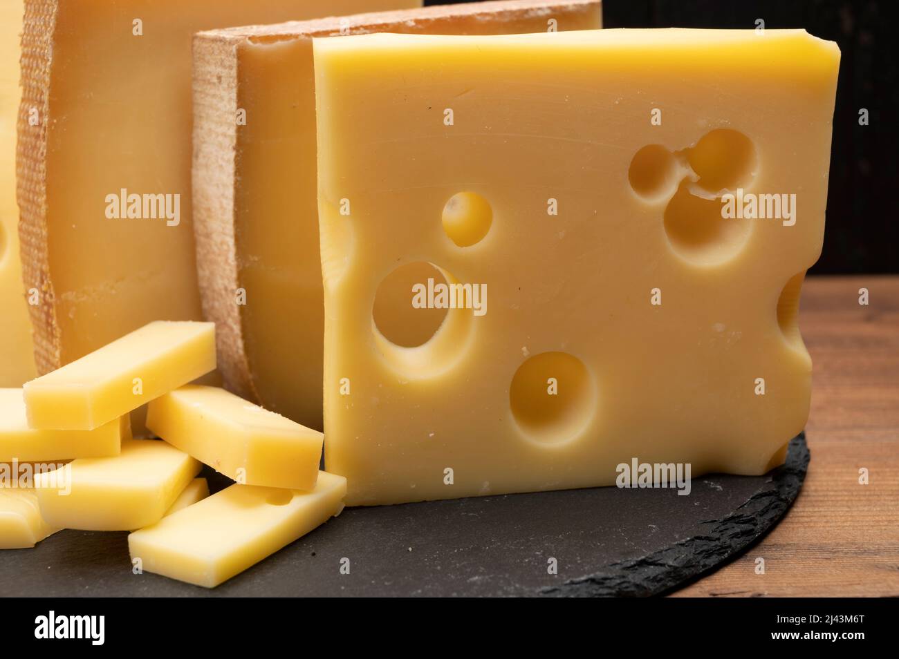 Swiss cheese collection, emmentaler with holes, gruyere, appenzeller ...