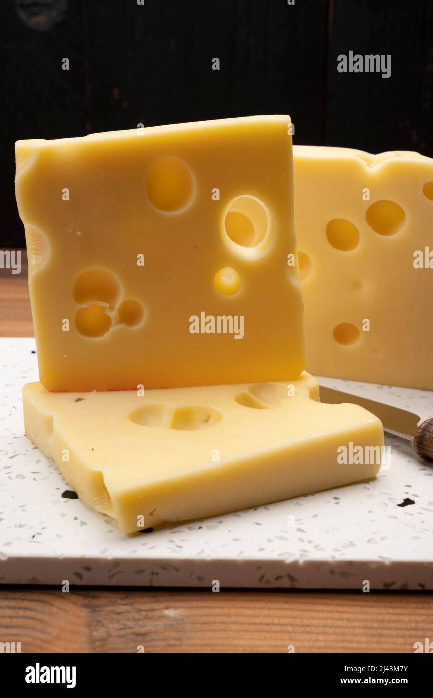 Swiss cheese collection, yellow emmentaler or emmental cheese with