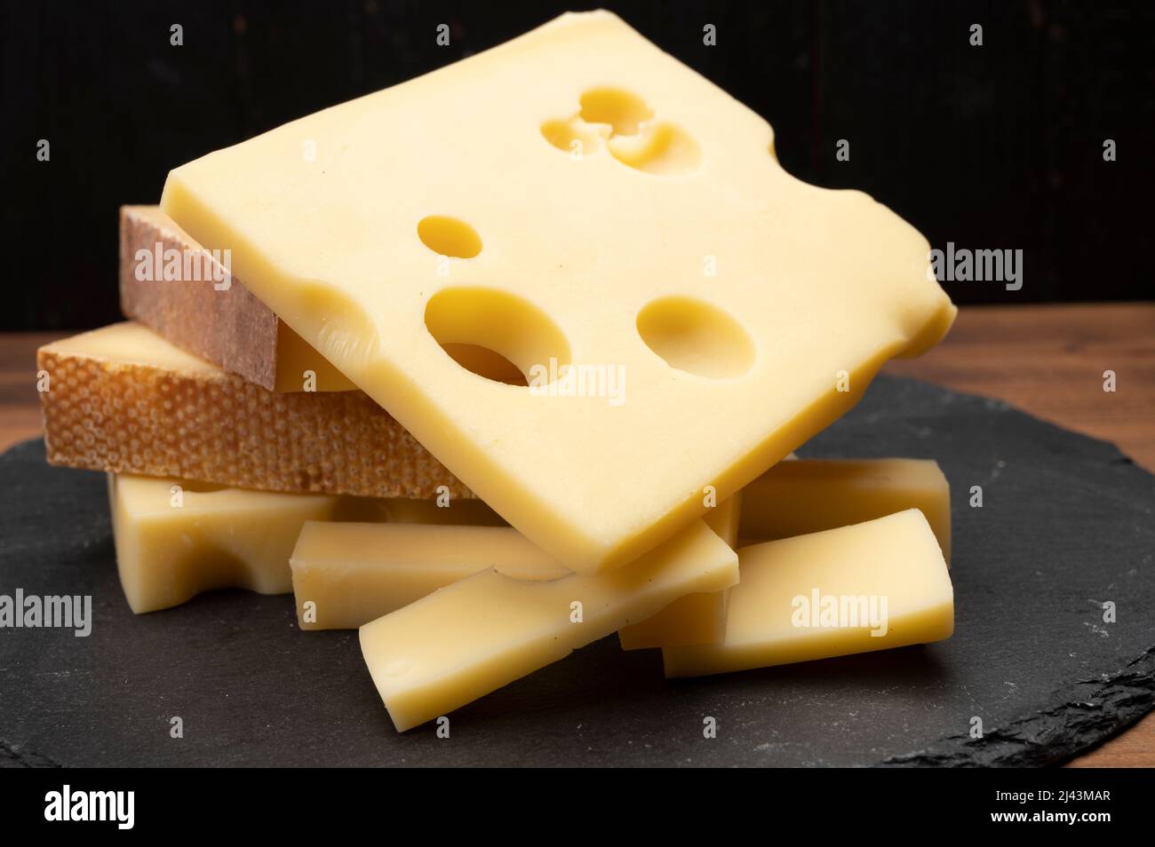 Swiss cheese collection, emmentaler with holes, gruyere, appenzeller ...