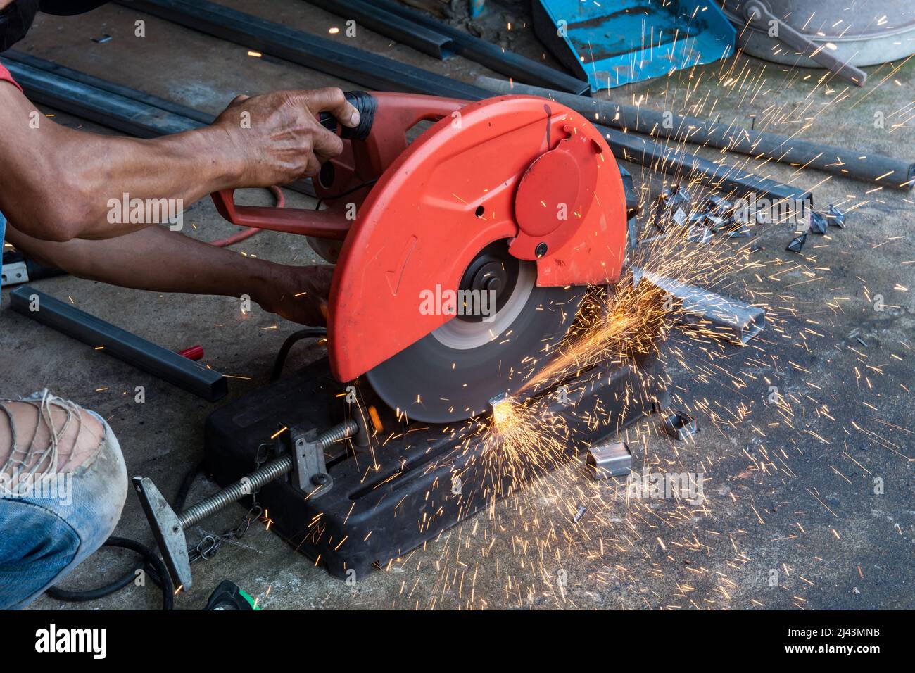 Worker cut steel with cut off wheel saw, cutting wheels Stock Photo - Alamy
