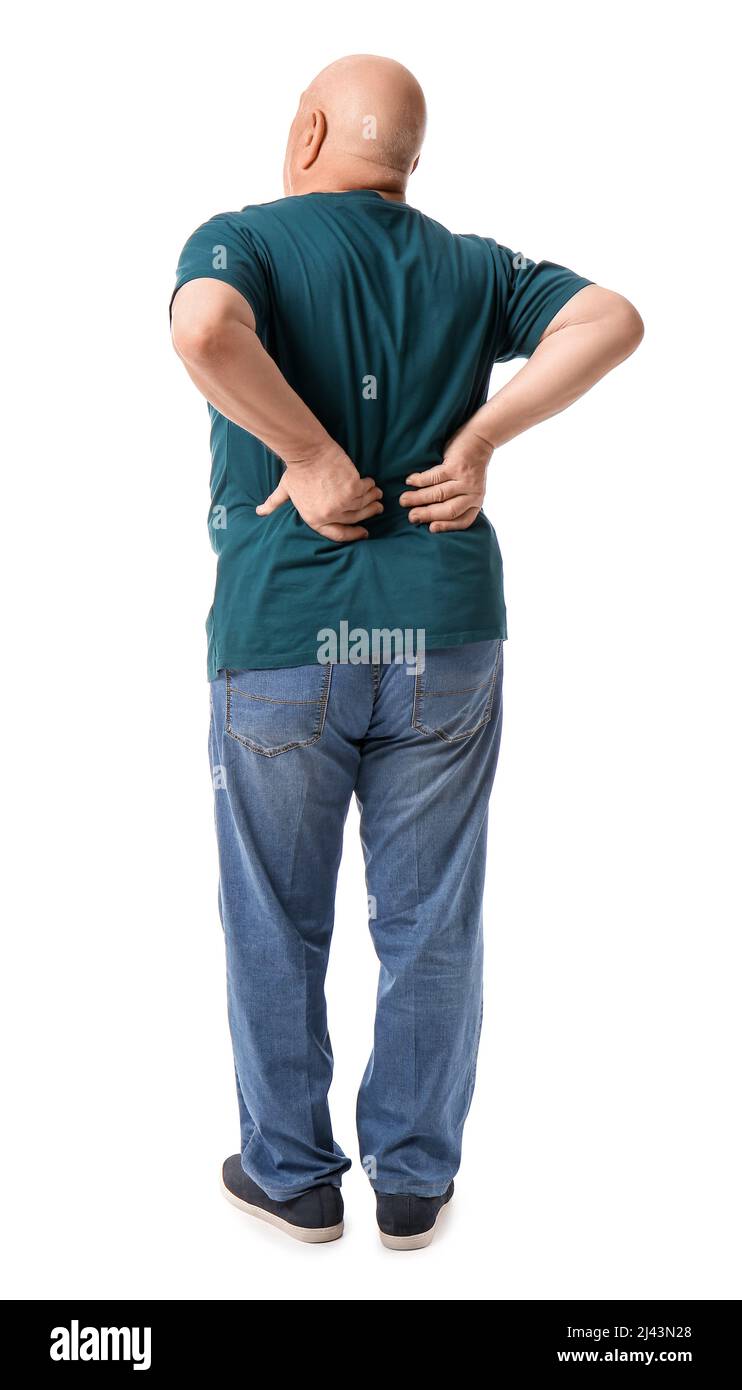 Senior man suffering from back pain on white background Stock Photo - Alamy