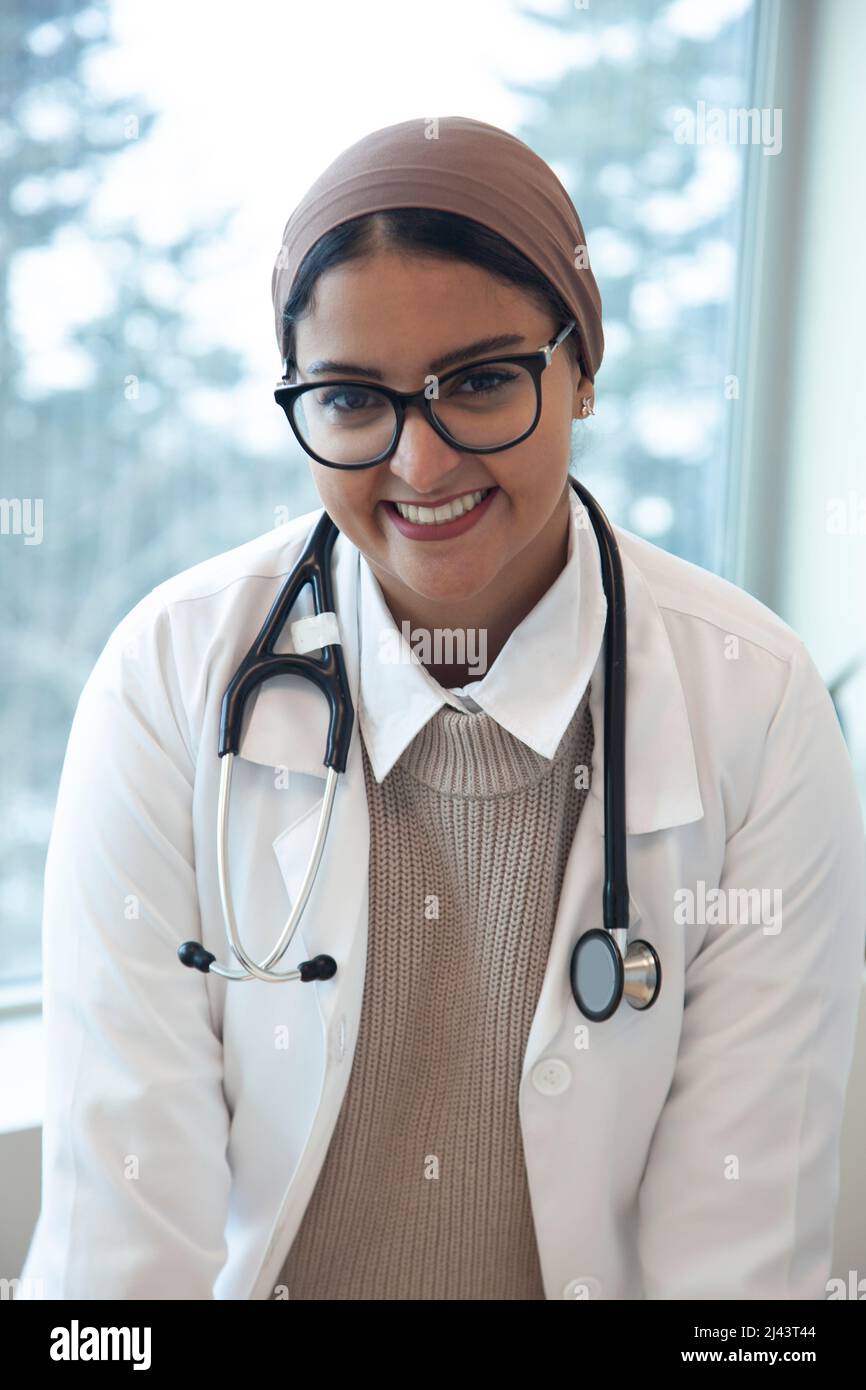 portrait of a beautiful doctor with head scarf and stethascope Stock Photo
