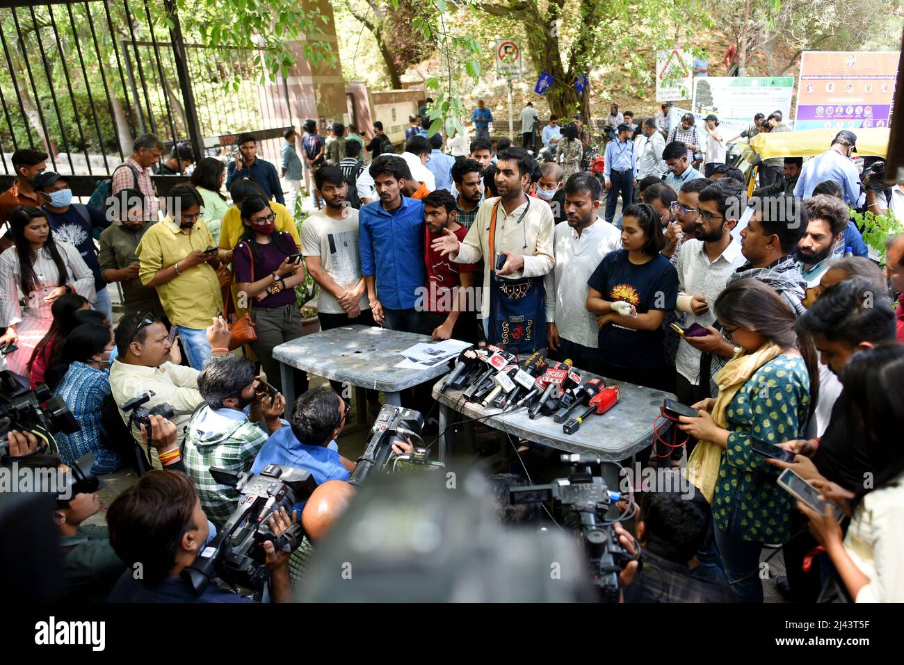 New Delhi, India. 11th Apr, 2022. NEW DELHI, INDIA - APRIL 11: Akhil Bharatiya Vidyarthi Parishad (ABVP) students interact with the media outside Jawaharlal Nehru University (JNU) campus on April 11, 2022 in New Delhi, India. The clash between two student groups - a left-wing student union and RSS-linked ABVP (Akhil Bharatiya Vidyarthi Parishad) - over a hostel mess serving chicken for dinner on the occasion of Ram Navmi yesterday left at least six injured. (Photo by Amal KS/Hindustan Times/Sipa USA) Credit: Sipa USA/Alamy Live News Stock Photo