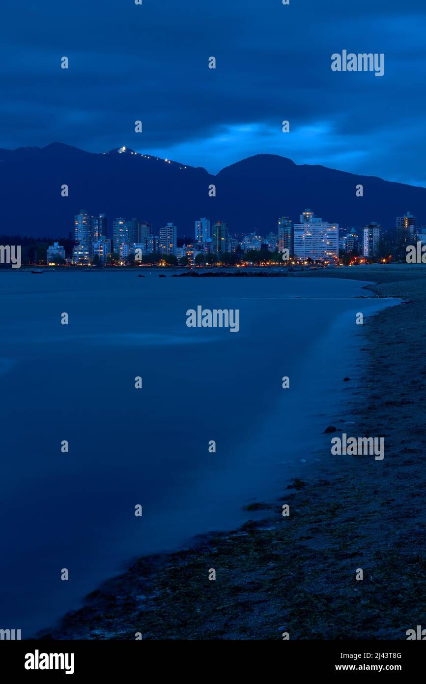 English Bay Beach Twilight. Condo towers on the edge of English Bay