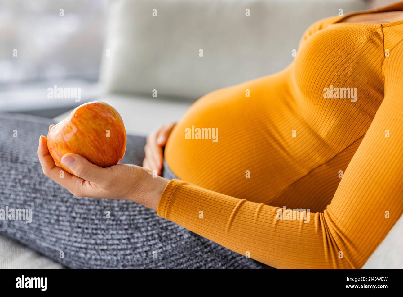 Pregnant woman eating healthy food hires stock photography and images