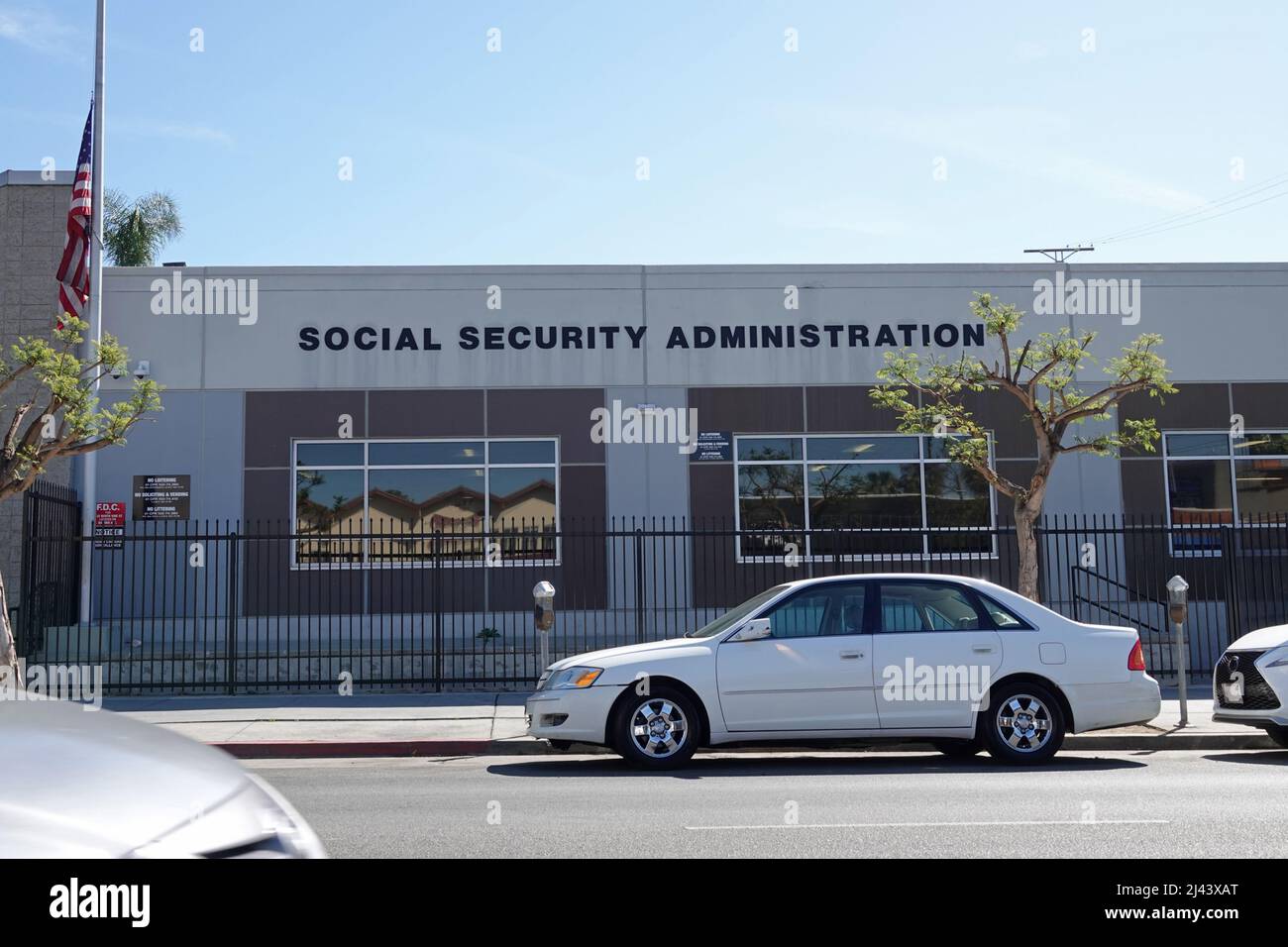 The exterior of a Social Security Administration building is shown in the USA during the day. Stock Photo