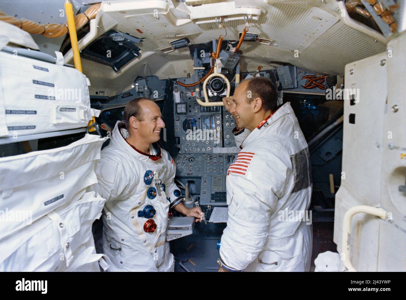 Astronauts Charles Conrad (on left), commander; and Alan Bean, lunar module pilot, in the Apollo Lunar Module Mission Simulator during simulator training at the Kennedy Space Center (KSC). Stock Photo