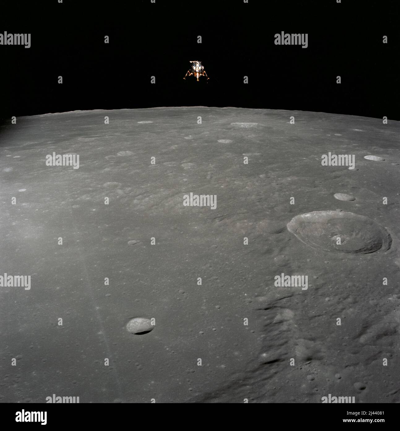 The Lunar Module Intrepid from Apollo 12 in orbit above the moon Stock Photo