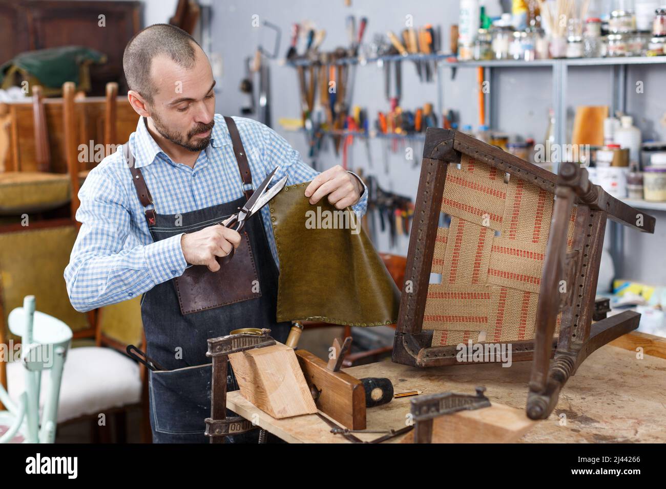 Craftsman using carpentry tools for restoration Stock Photo Alamy