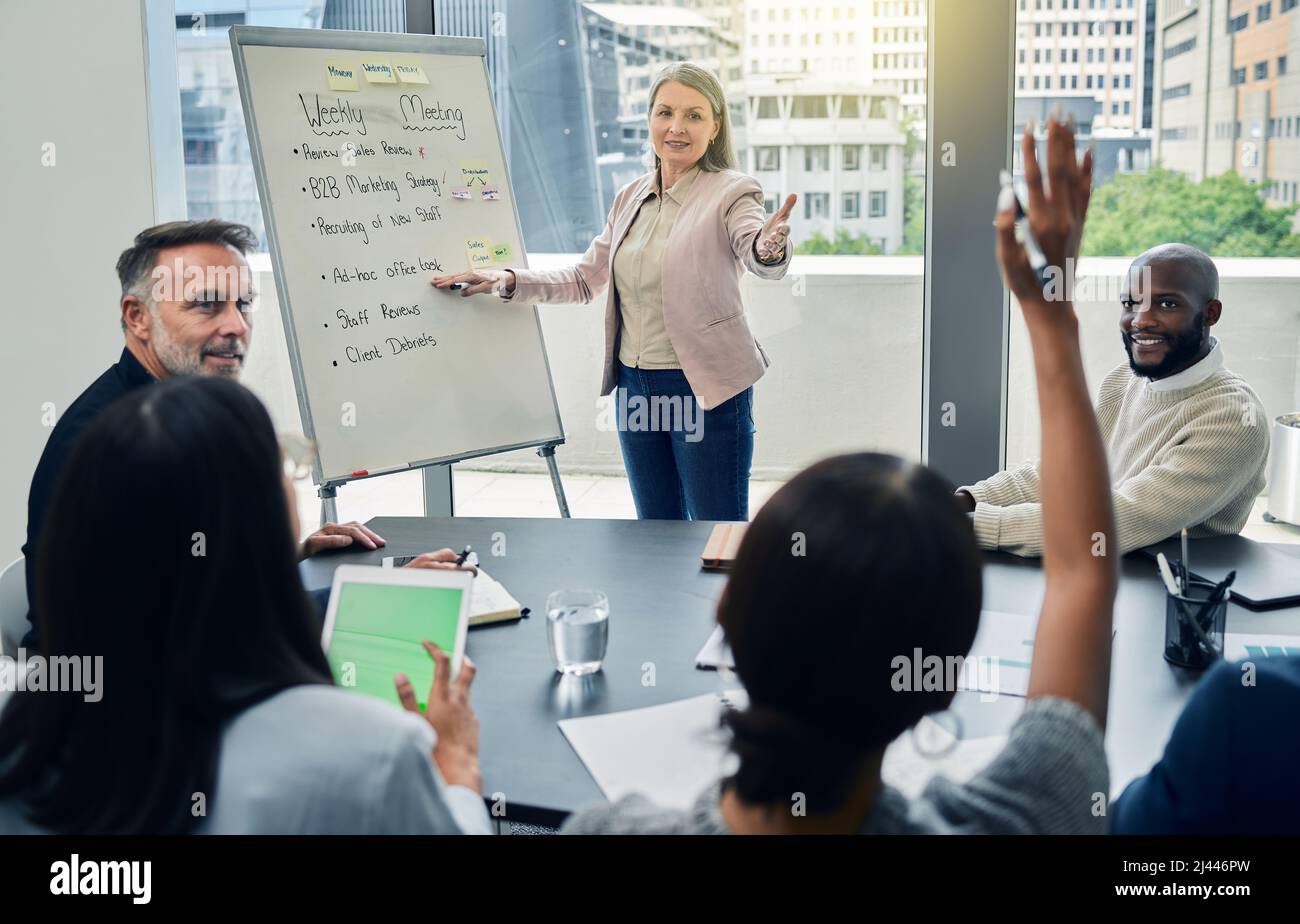 Thats an excellent idea. Shot of a mature businesswoman giving a training presentation. Stock Photo