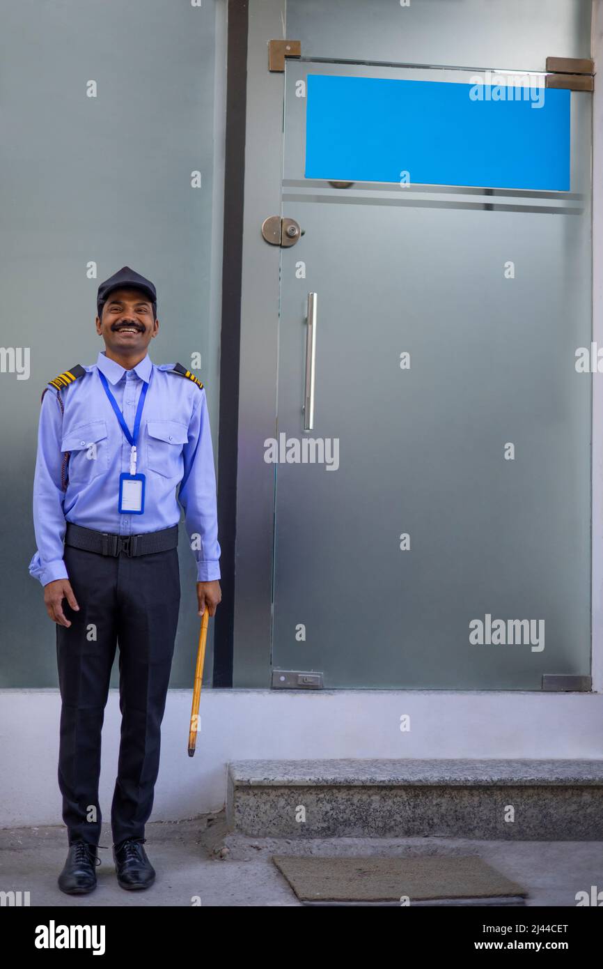 Indian security guard in front hi-res stock photography and images - Alamy