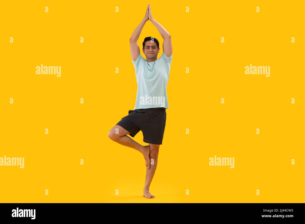 Portrait of a young man practicing yoga Stock Photo