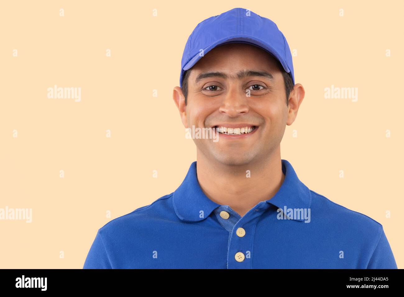 Close-up portrait of a courier delivery boy Stock Photo