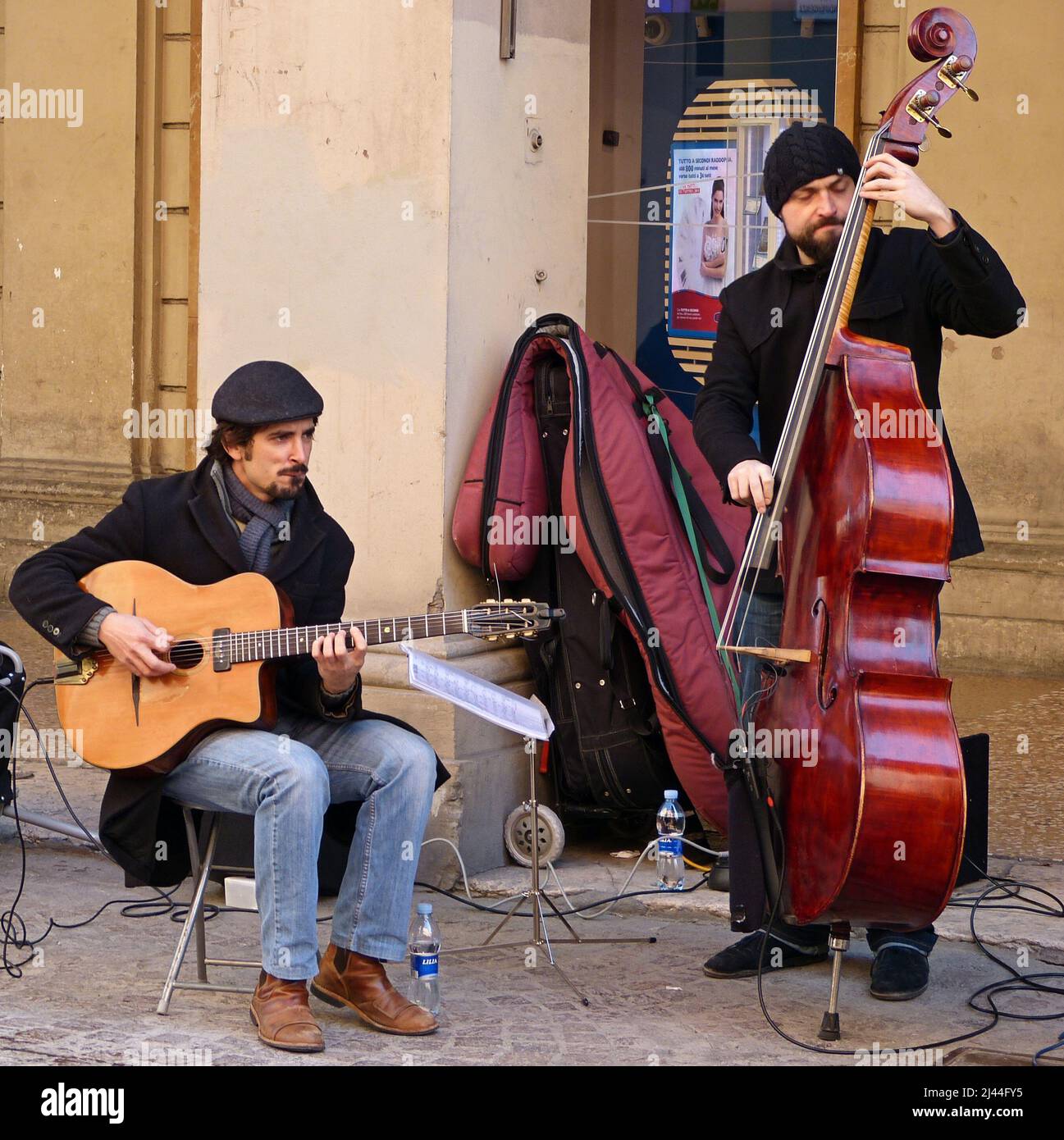 Street performers playing jazz music in the historic downtown district ...