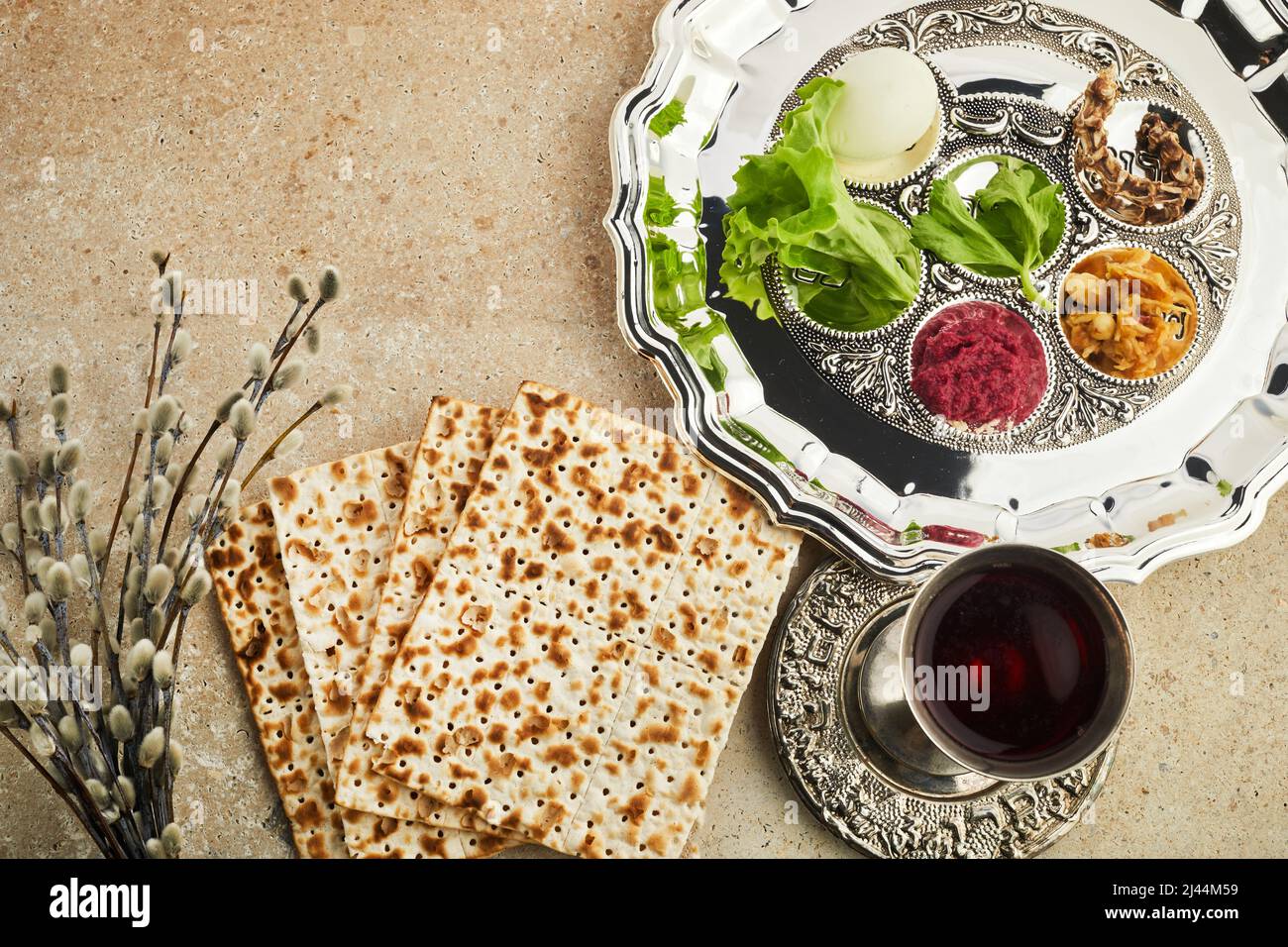 Passover Seder plate with traditional food ontravertine stone
