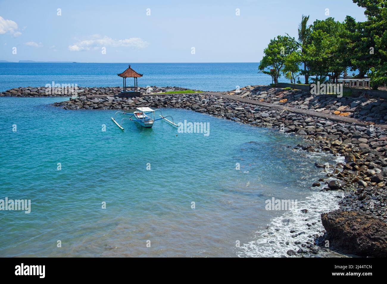 Boats at Candidasa Beach in East Bali, Indonesia. Stock Photo